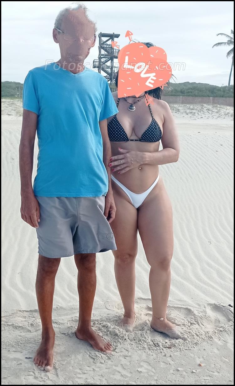 Esposa curtindo as férias na praia